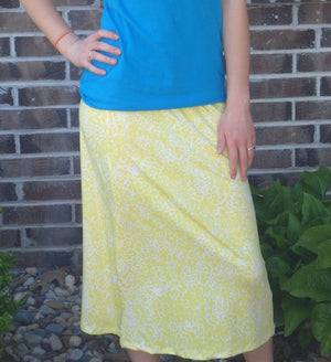 yellow and white print skirt