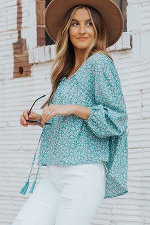 Ditsy Floral Tassel Tie High-Low Blouse